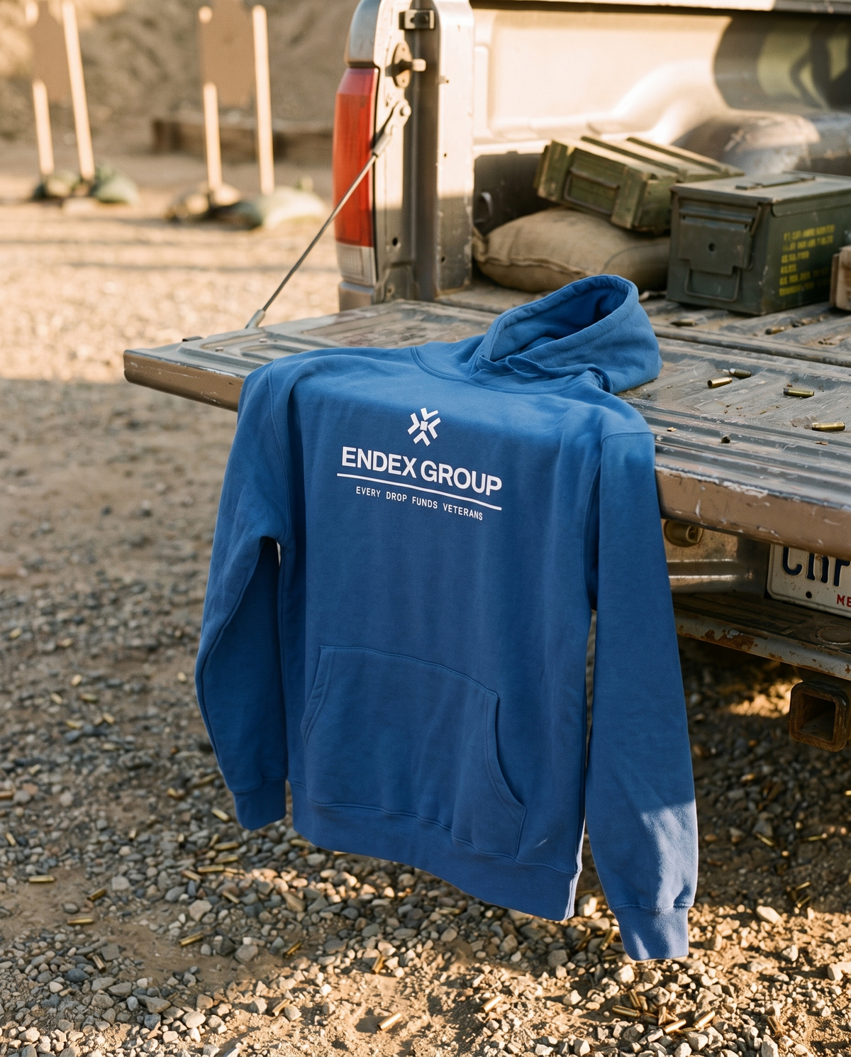 ENDEX Everyday Hoodie draped over a range tailgate