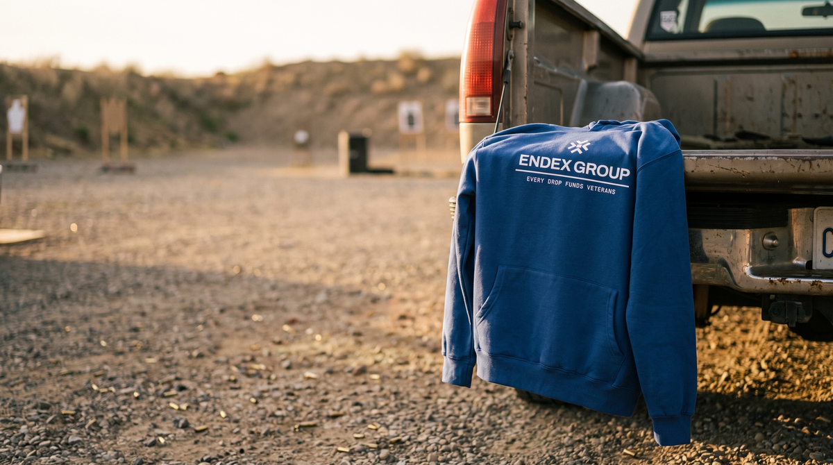 ENDEX blue hoodie at the range — brand band