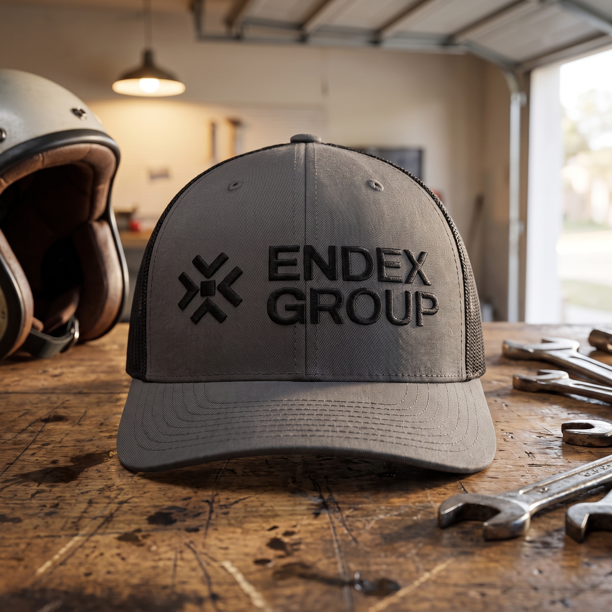 ENDEX Group Classic Trucker Cap in Charcoal/ Black — lifestyle shot