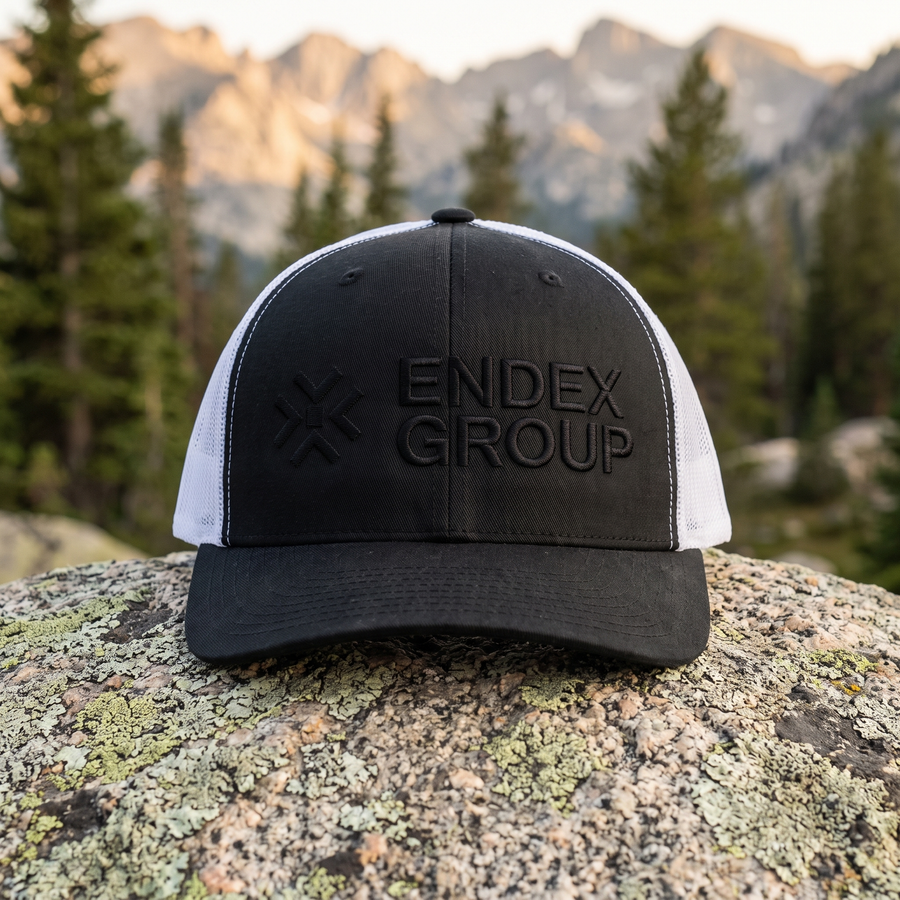 ENDEX Group Classic Trucker Cap in Black/ White — lifestyle shot